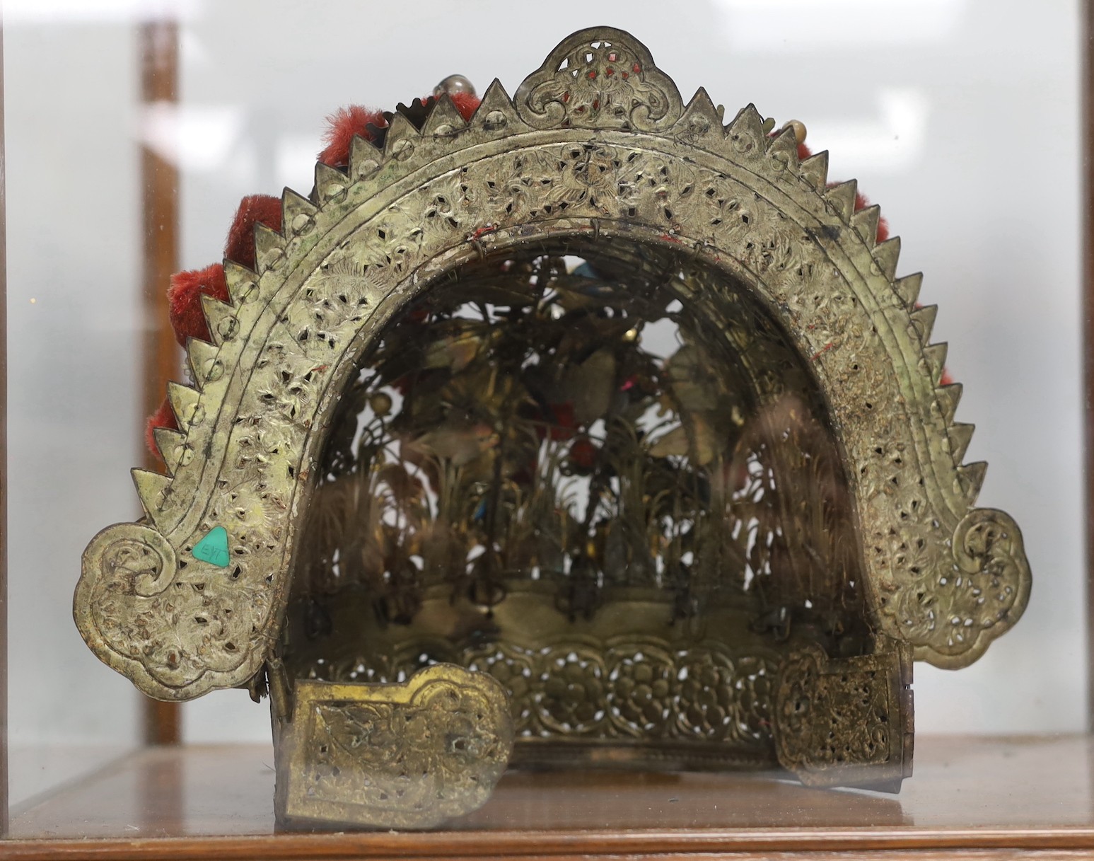 A Chinese gilt metal, kingfisher feather and glass mounted lady’s wedding headdress, late Qing dynasty, decorated with phoenixes